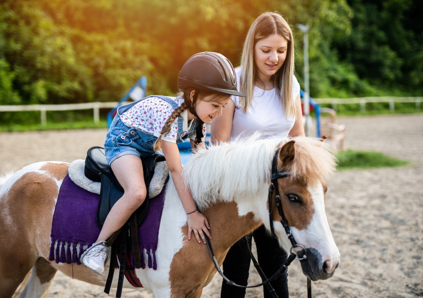 Jodinėjimas žirgais ar poniais vaikui
